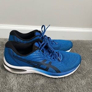 Men’s ASICS sneakers.